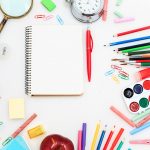 School set with notebooks, pencils, brush, scissors and apple on white background villers-semeuse